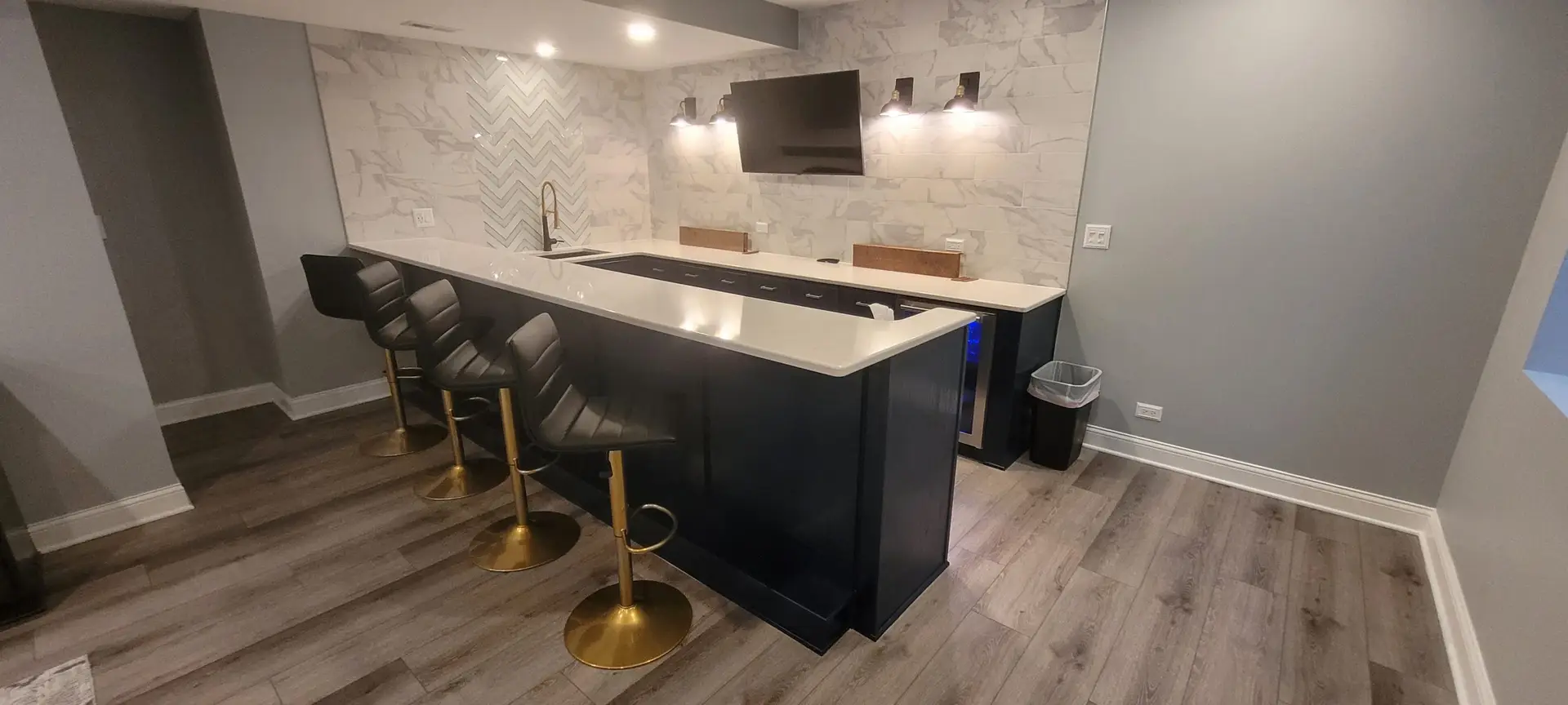 basement, dark cabinets on bar, light grey floor