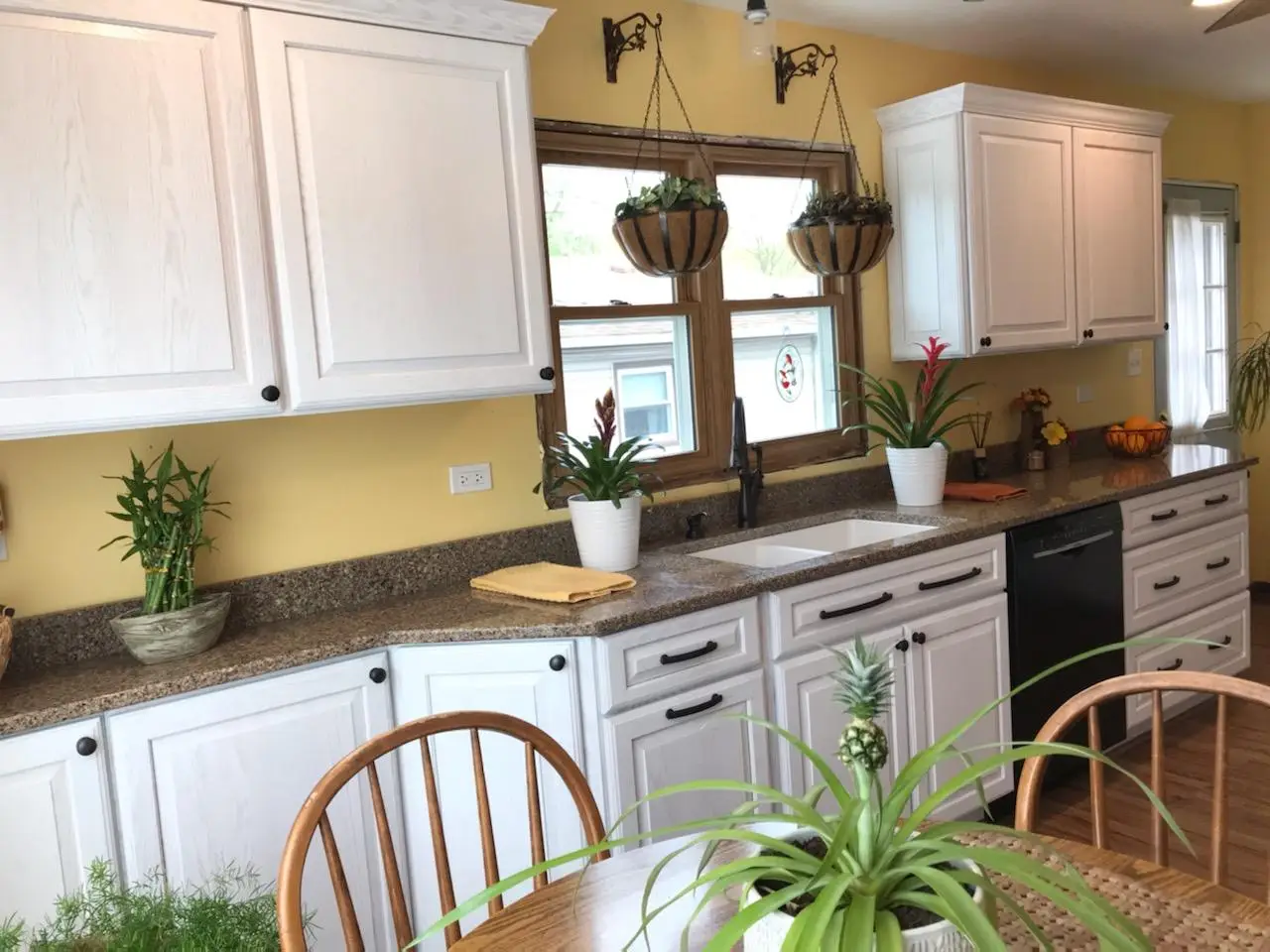 Kitchen, white cabinets, dark granite