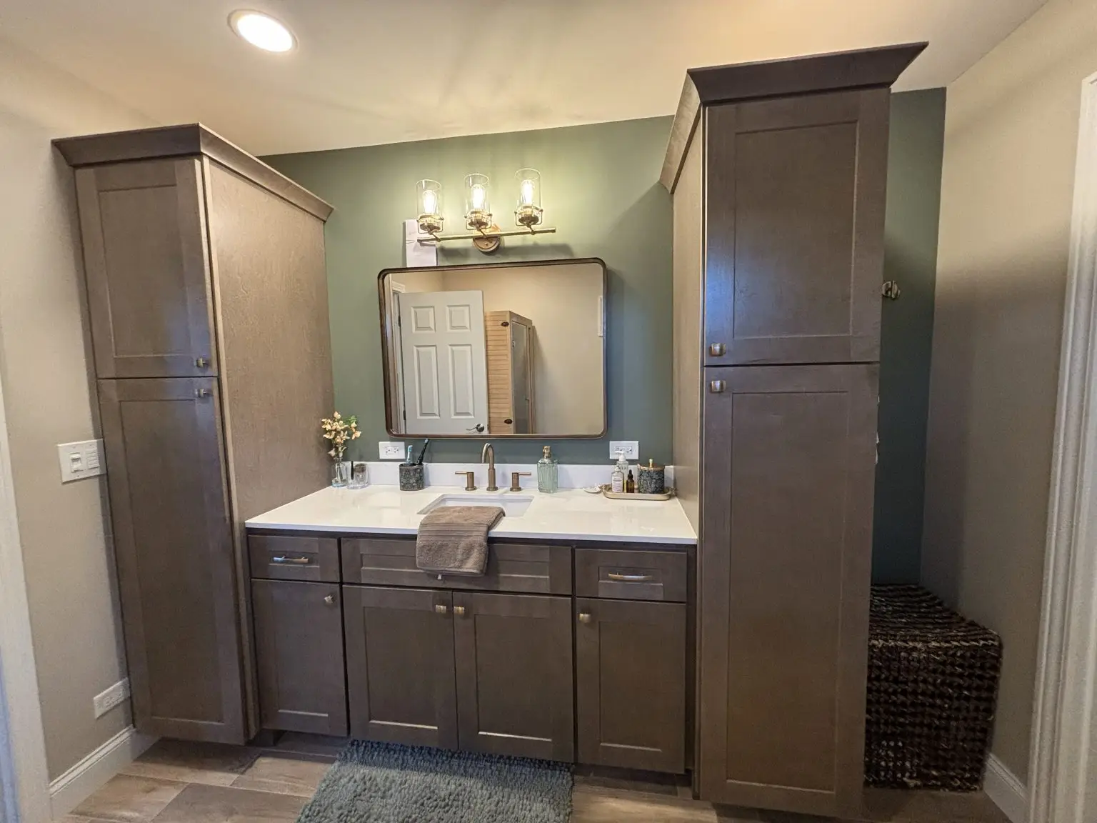 wooden cabinets, white counter, champagne gold finishes